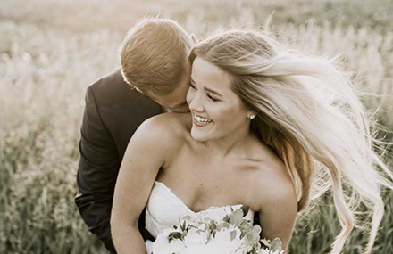 Bridge and groom smiling